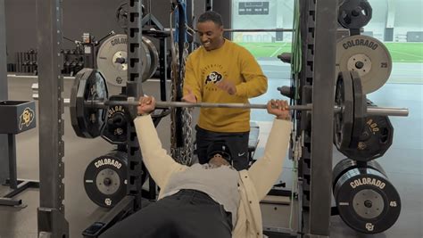 Colorado fans got to witness a bench press challenge between Deion Sanders, his son Deion Jr, known as Bucky, and assistant coaches Sam Malone and Shadd Davis. . Deion sanders bench press